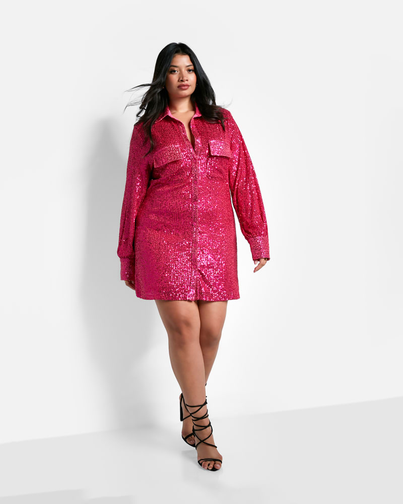 Front of a model wearing a size 2X Sapphire Sequin Oversized Shirt Dress in Fuchsia by Rebdolls. | dia_product_style_image_id:324379